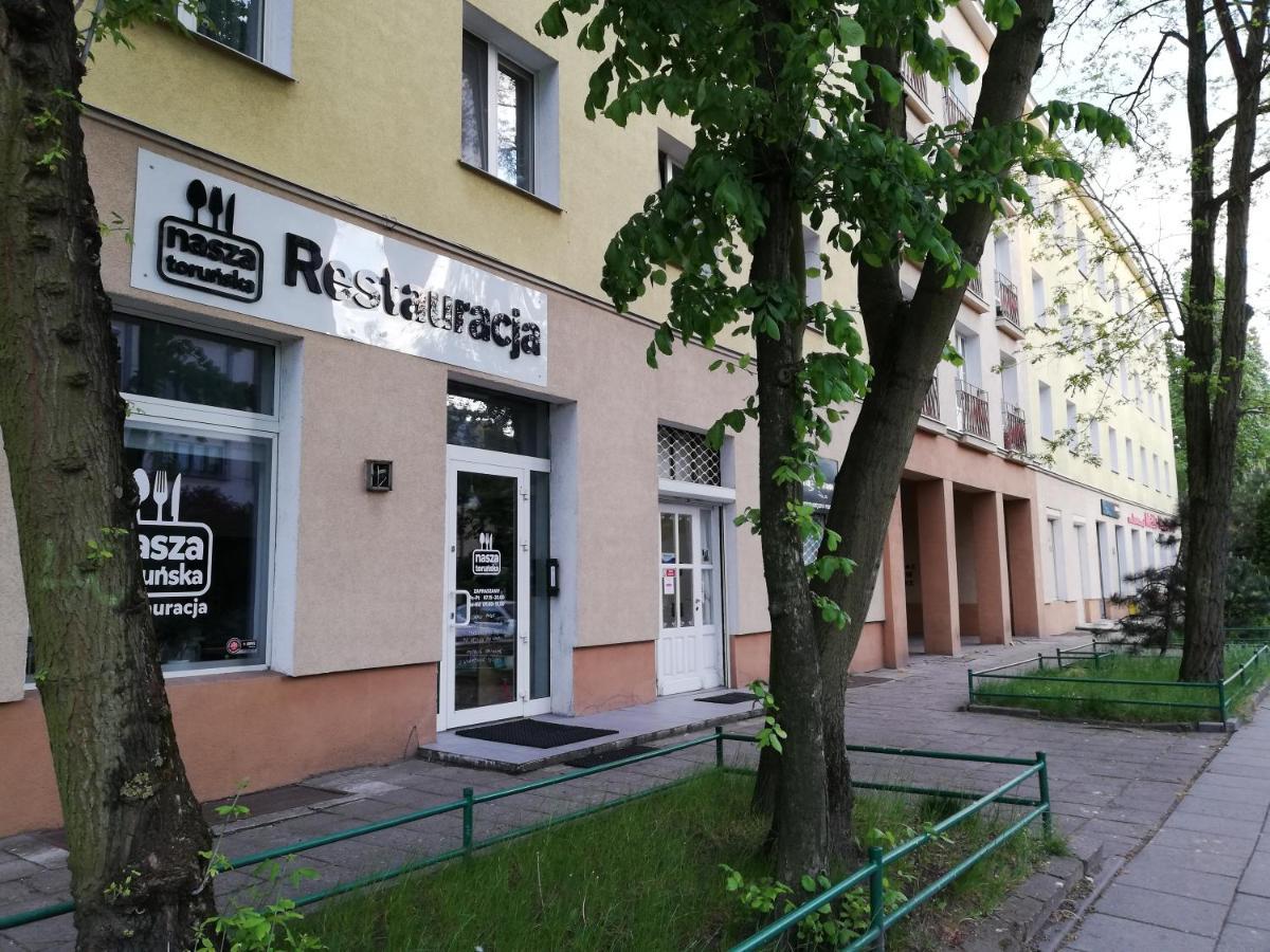 Mieszkanie Kawalerka Торунь Экстерьер фото